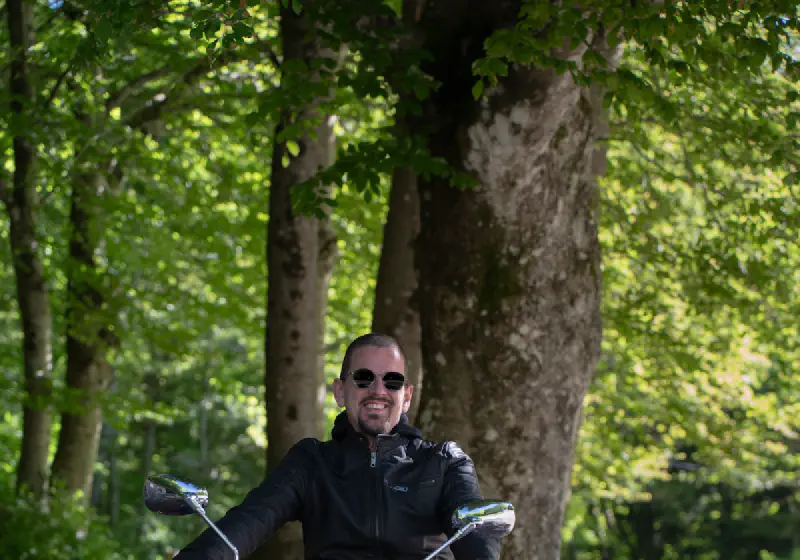Stefano on His Motorcycle in the Woods